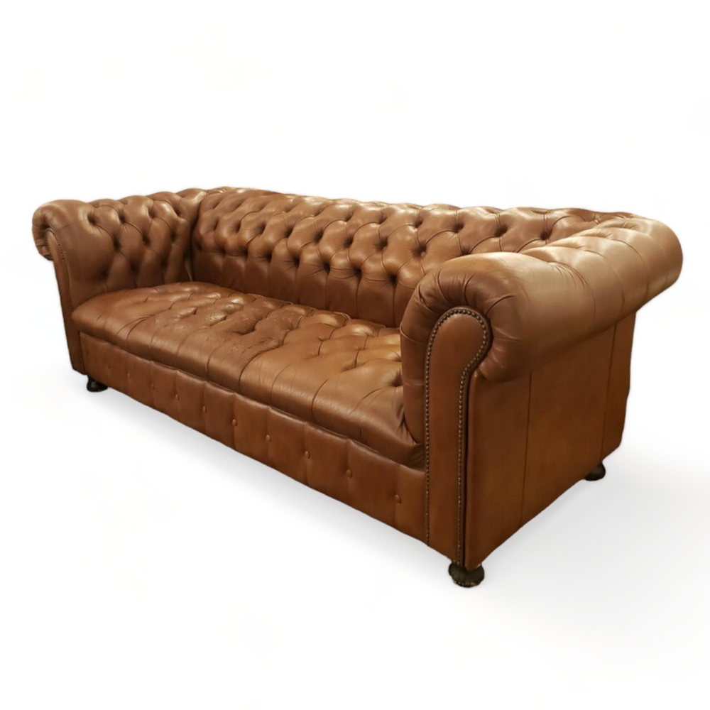 Vintage leather chesterfield with mild distressing in a warm chocolate leather made by empire furniture co