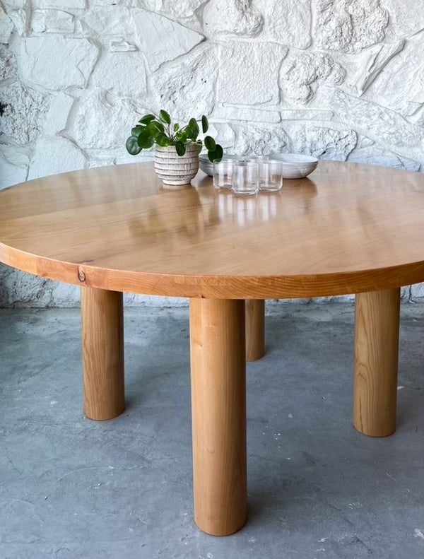 custom alder wood dining table with ceramics in atwater village