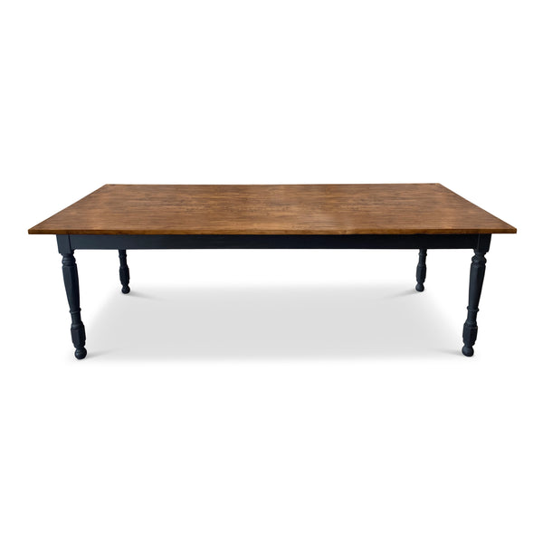 Hardwood farm table with natural finished alder wood top and black painted turned legs. 