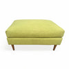 custom blanche ottoman with wood legs in atwater village furniture store