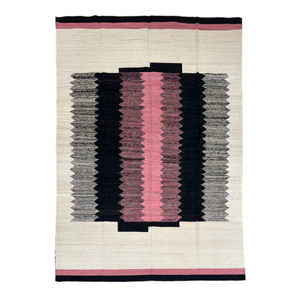 black, pink and cream kilim rug with zigzag overlay stripes in middile
