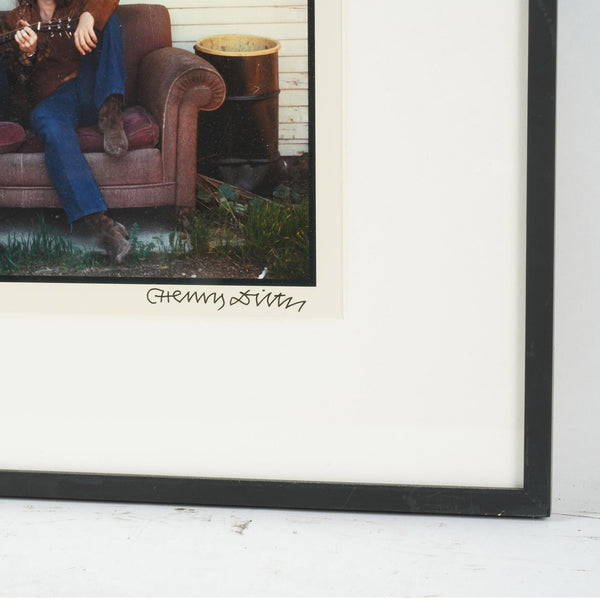 close up of signature on framed photograph by henry diltz