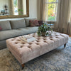 Custom pink velour ottoman coffee table in Atwater village interior design space