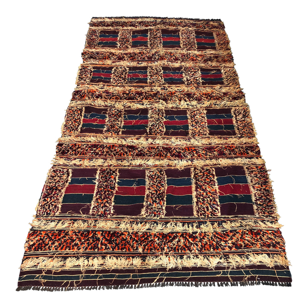 textured moroccan area rug in jewel tones