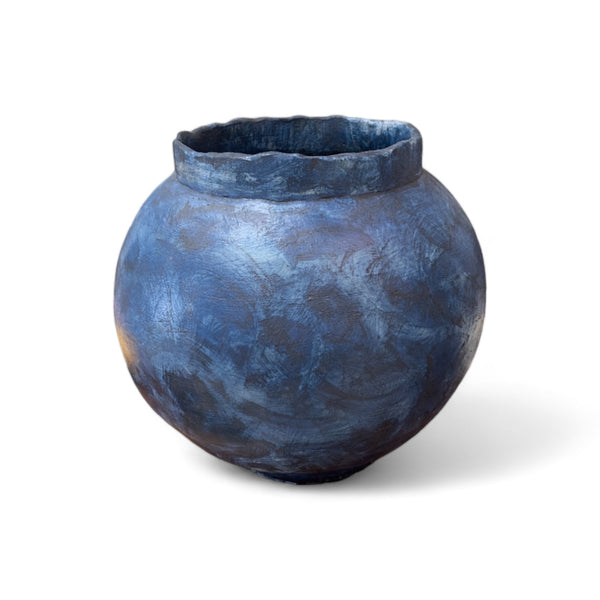 Handmade round blue glaze ceramic pot with an organic lip at the top 