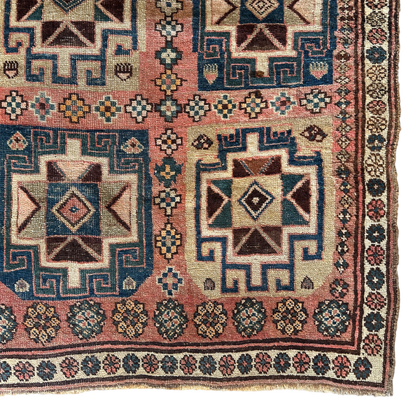 Vintage Turkish accent rug with blue, off white, pink and brown details