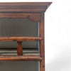 This 19th-century Provincial kitchen hutch, or "plate rack," is a tall, narrow wooden cabinet, standing freely on the floor. It has five shelves, each lined with a fabric featuring thin vertical stripes. The shelves are open at the front, with wooden slats that act like barriers to hold plates in place. The wood has a warm, aged texture, with a smooth yet slightly worn feel from years of use. The left side of the hutch has a hinge, allowing the front to swing open, secured with a simple iron latch. 