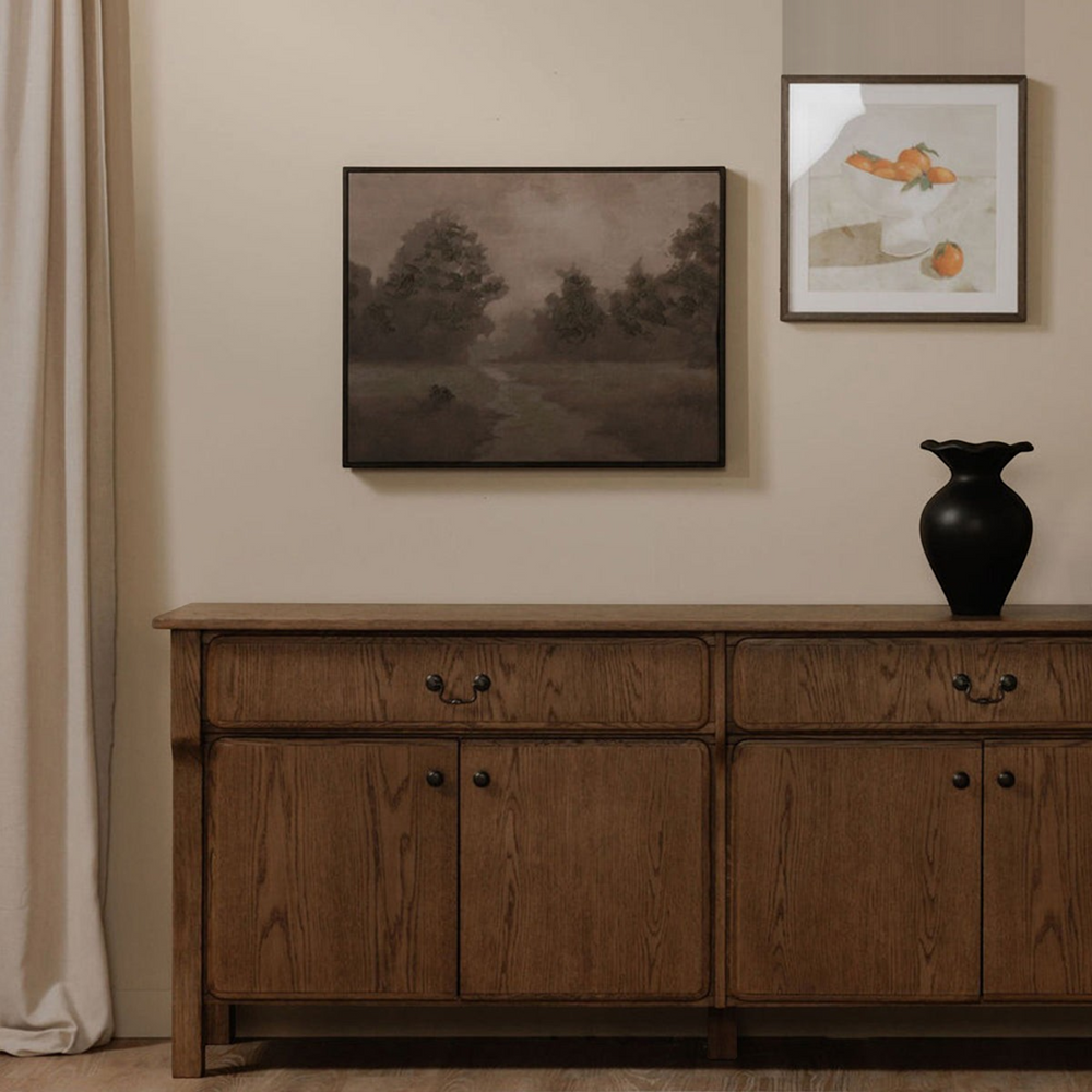 deKor Alder framed painting featuring a moody, dark woodland landscape with a path in deep purple and brown tones.