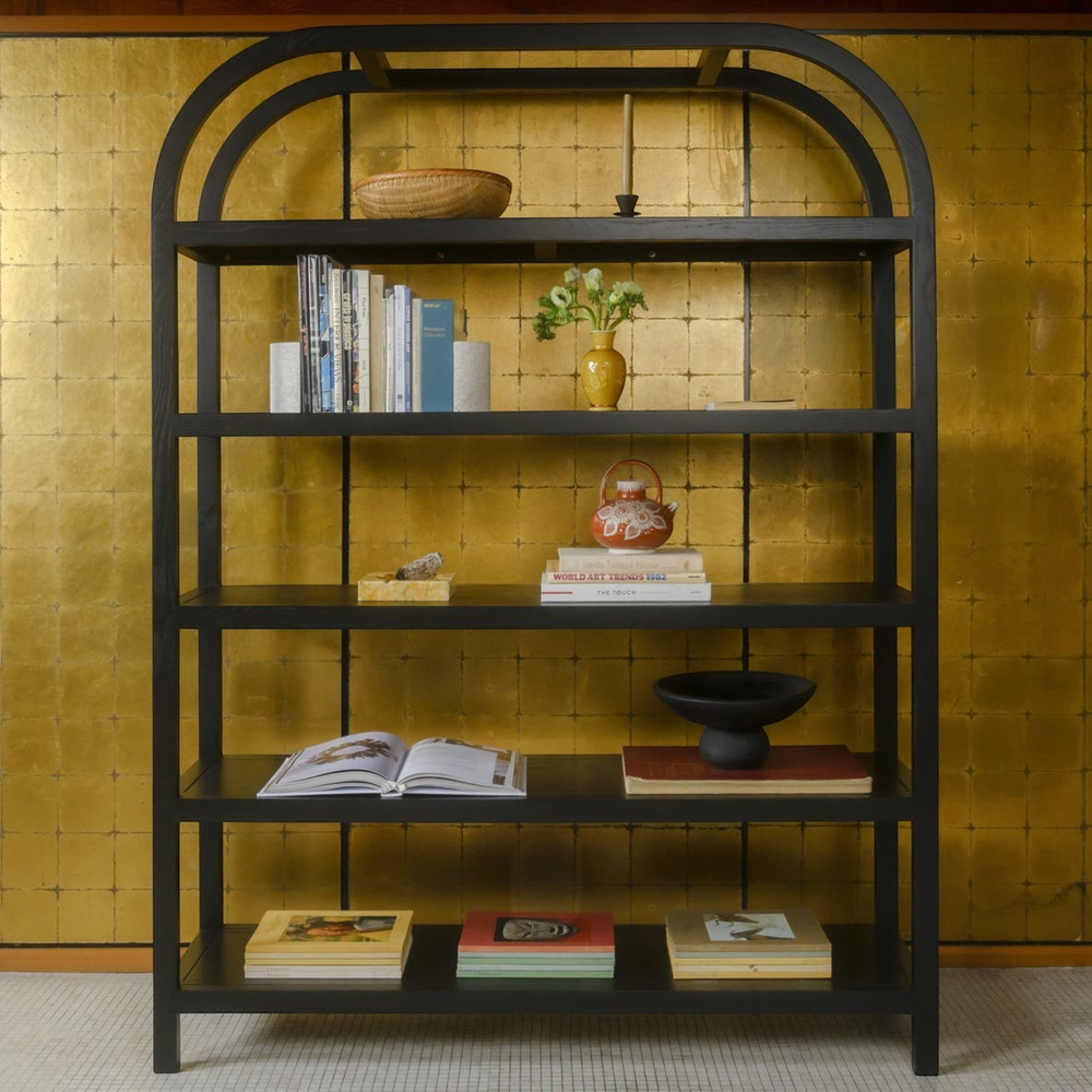 deKor arched black bookcase with five oak-veneered shelves and a modern, minimalist frame design.