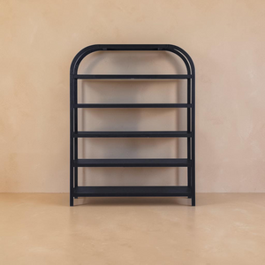 deKor arched black bookcase with five oak-veneered shelves and a modern, minimalist frame design.