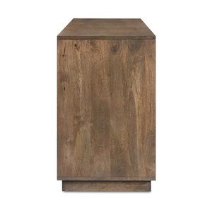 deKor Bowen sideboard in solid mango wood with a matte sandblast brown finish, shown from a side profile view.