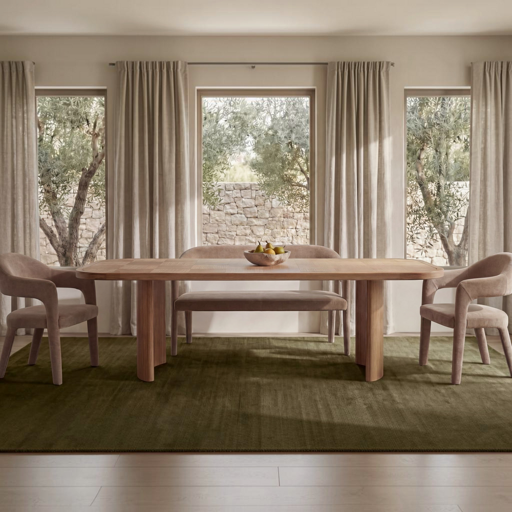 deKor camel polyester barrel back dining bench with a curved iron frame and foam padding