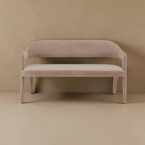 deKor camel polyester barrel back dining bench with a curved iron frame and foam padding