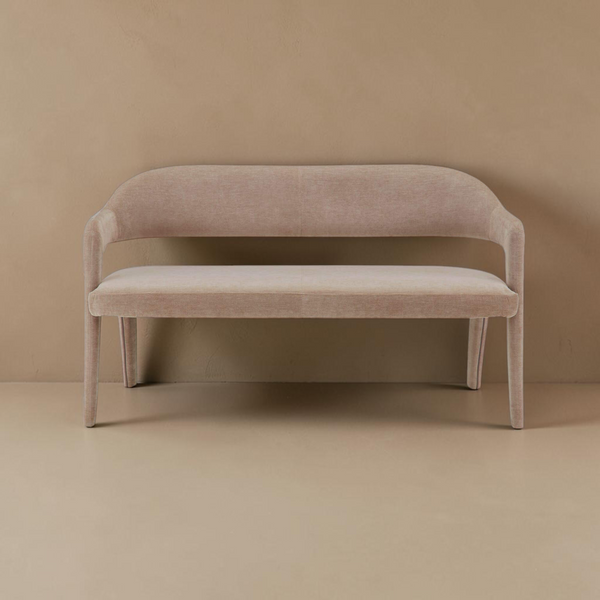 deKor camel polyester barrel back dining bench with a curved iron frame and foam padding