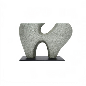 deKor charcoal grey freeform modernist sculpture made of Ecomix on a thin black metal base for home decor.