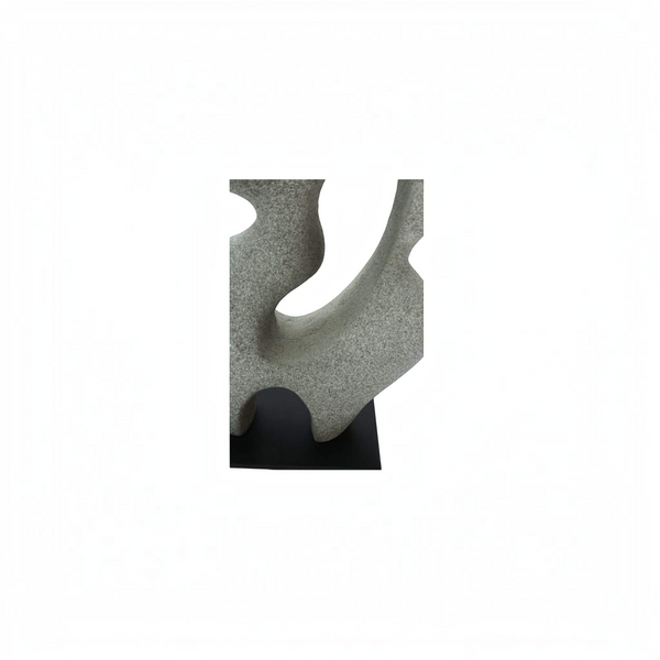 deKor charcoal grey freeform modernist sculpture made from Ecomix on a thin black metal base