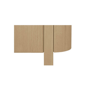 deKor natural oak veneer sideboard featuring a modern curved corner design and solid wood leg detail.