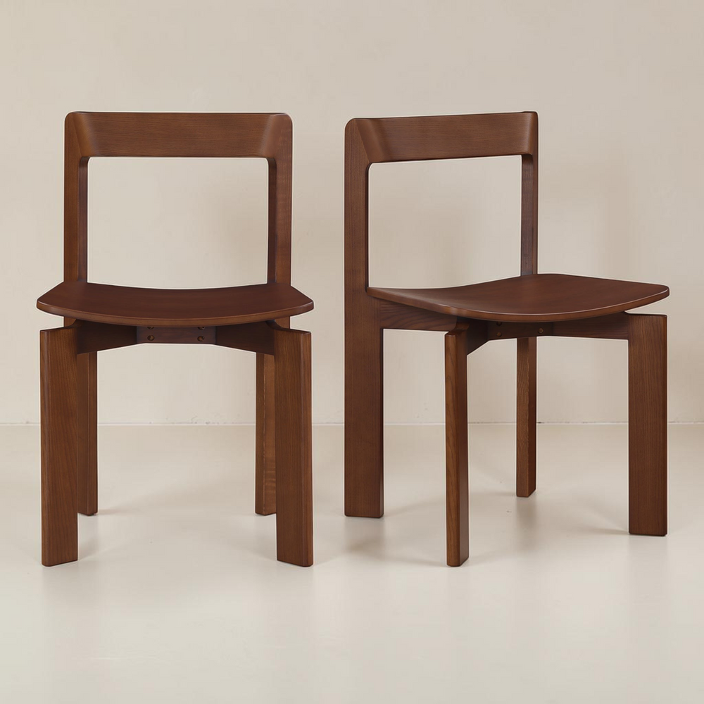 deKor Daifuku brown dining chairs in solid ash wood with rounded edges and Japanese-inspired joinery, set of two.