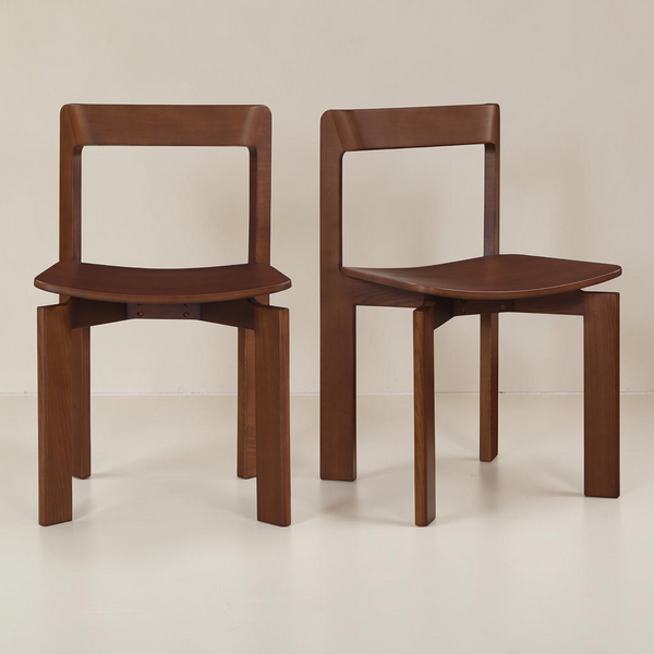deKor Daifuku brown dining chairs in solid ash wood with rounded edges and Japanese-inspired joinery, set of two.
