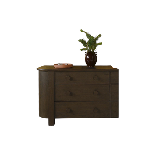 deKor dark brown oak veneer 6-drawer dresser with curved corners and solid oak handles in a contemporary style
