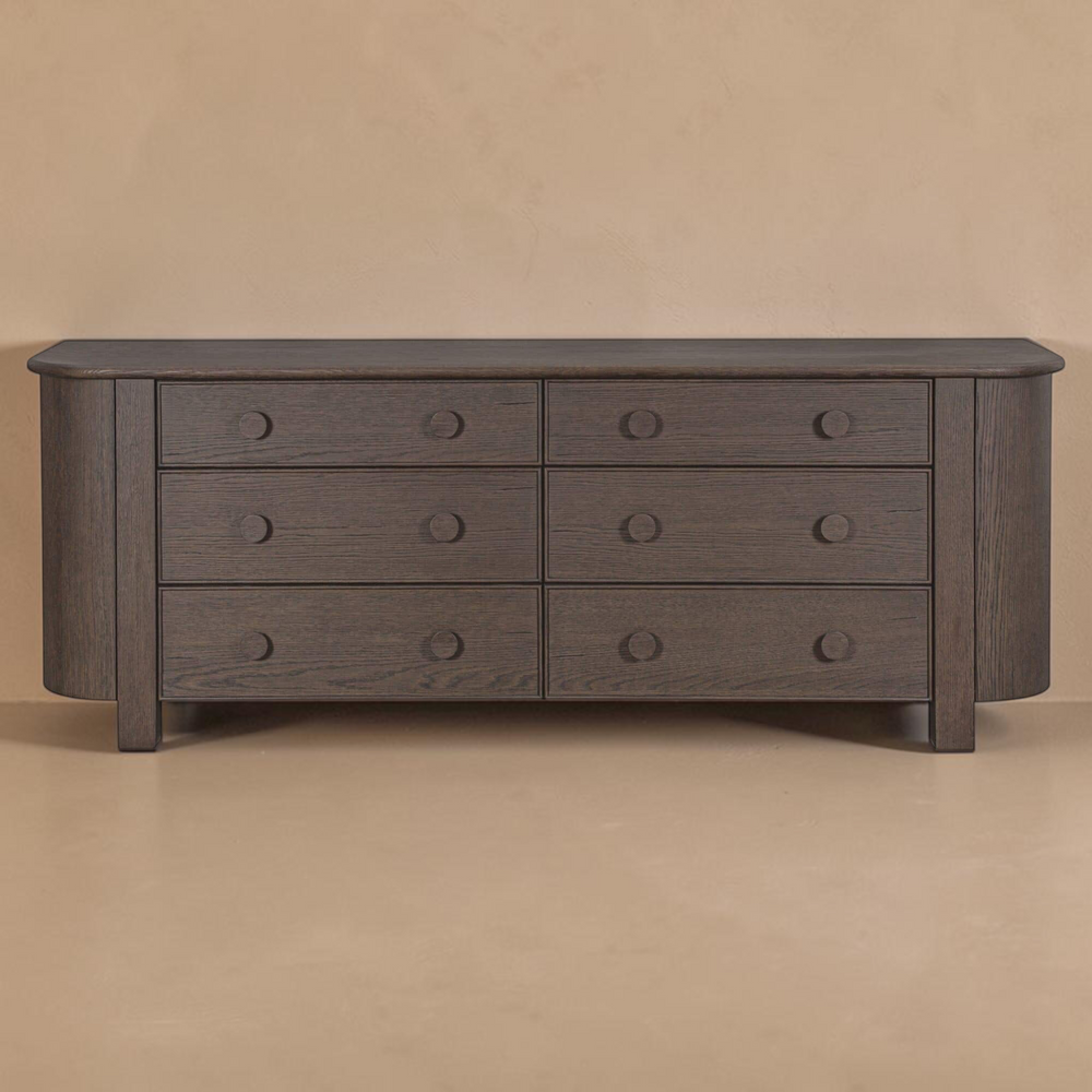 deKor dark brown 6-drawer dresser with curved corners, solid oak handles, and contemporary oak veneer finish.