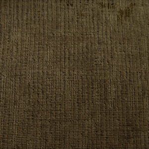 Close-up of dark green performance polyester fabric texture on a deKor modular chair.