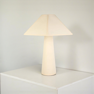 deKor Gigi table lamp in cream with a minimalist conical base and a matching square fabric shade