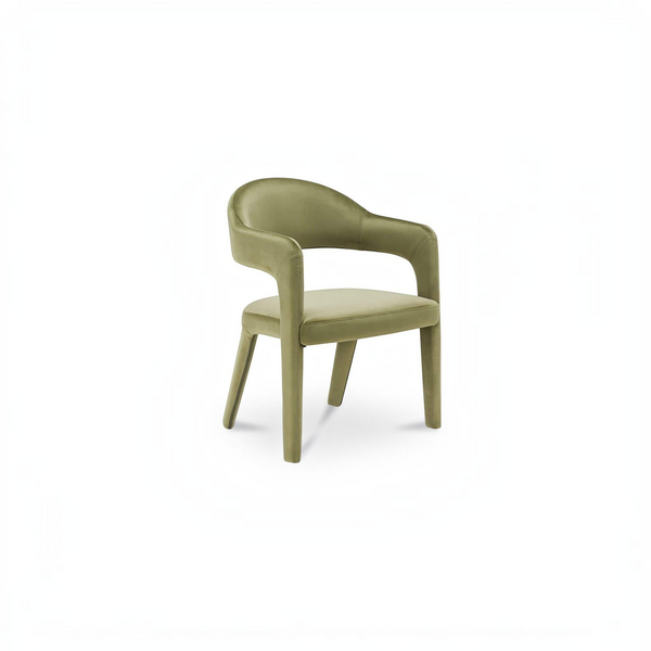 deKor barrel back dining chair in green velvet with a continuous curved frame and comfortable padded seat