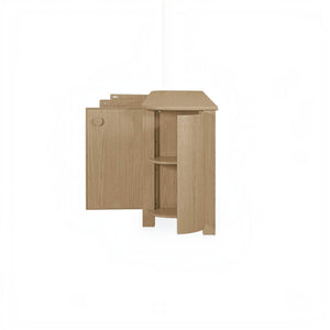 deKor natural oak sideboard with curved corners and open side storage compartment showing internal shelving