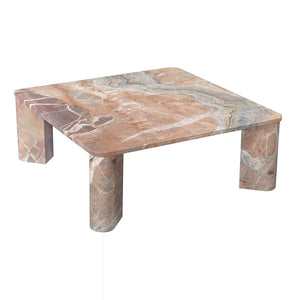 deKor Segment coffee table in orange Levante marble with a square top and rounded segmented legs