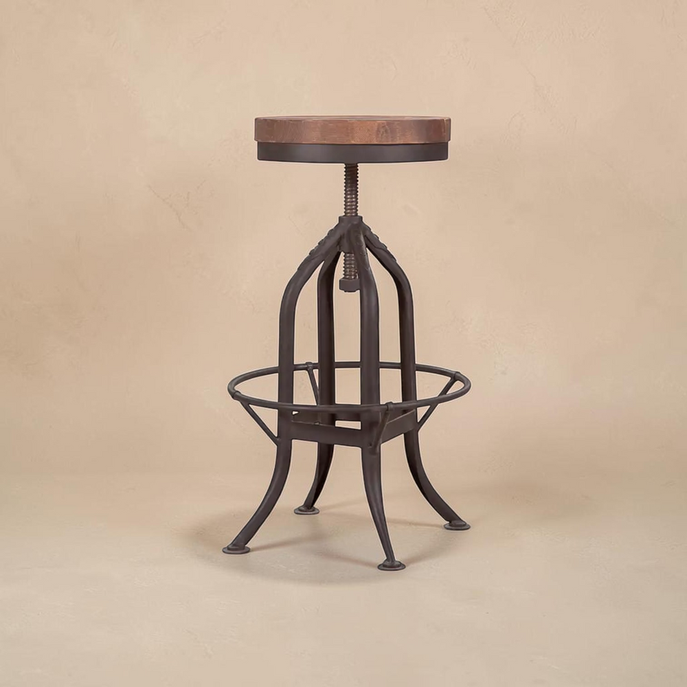 deKor rustic pedestal bar stool with a round wooden seat and adjustable height metal base in a dark finish