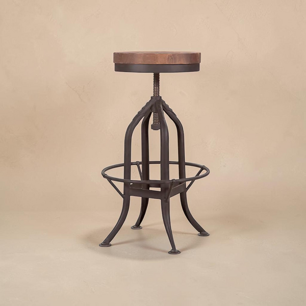 deKor rustic pedestal bar stool with a round wooden seat and adjustable height metal base in a dark finish