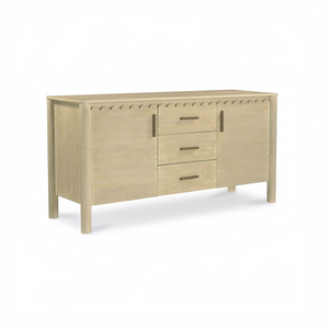 deKor natural wood sideboard featuring scalloped edge detailing, three central drawers, and minimalist iron handles.