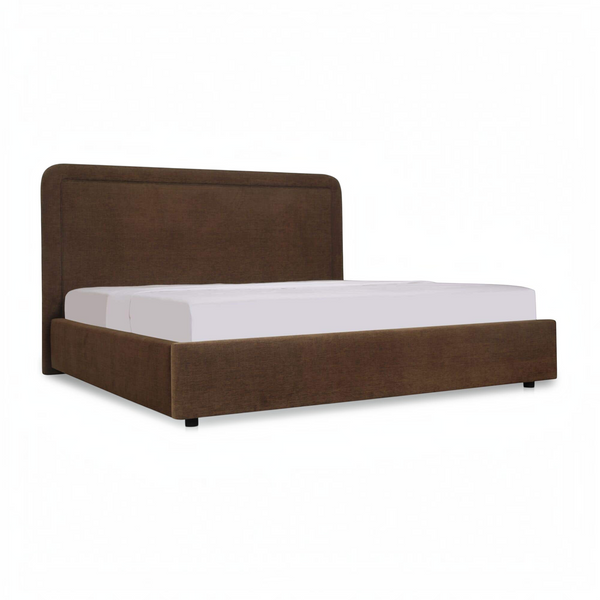 deKor Simon storage bed in brown fabric with a rounded headboard and piped detailing on a white background