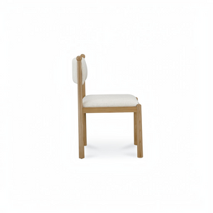 deKor Villetta dining chair in a side view featuring a striped upholstered seat and warm stained wooden frame.