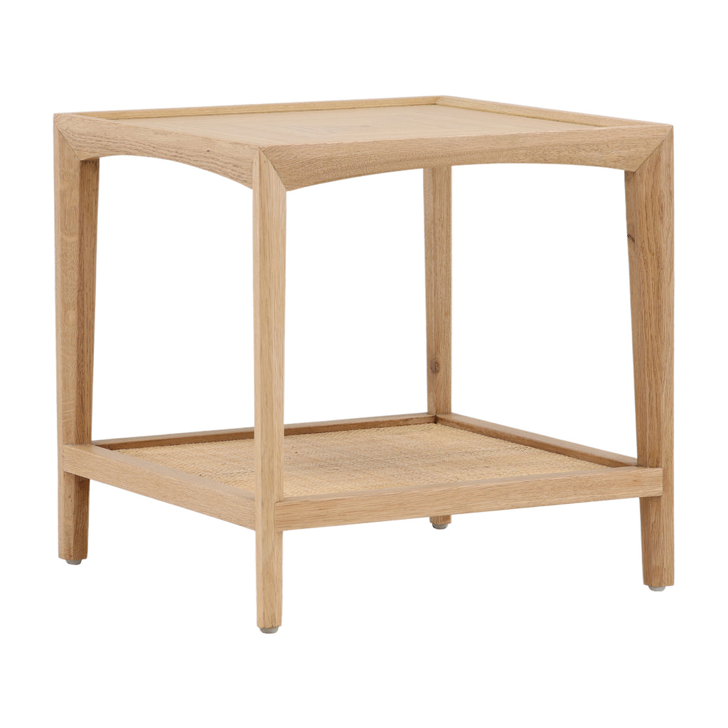 This is a square side table made of light-colored oak wood, with a simple and modern design. The top of the table is flat and smooth, while the lower part has a shelf made of woven rattan, giving it a textured feel. The table stands on four legs, each extending from the corners, providing a stable base. The overall feel is lightweight and natural, with a combination of smooth and textured surfaces.