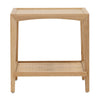 This is a square side table made of light-colored oak wood, with a simple and modern design. The top of the table is flat and smooth, while the lower part has a shelf made of woven rattan, giving it a textured feel. The table stands on four legs, each extending from the corners, providing a stable base. The overall feel is lightweight and natural, with a combination of smooth and textured surfaces.