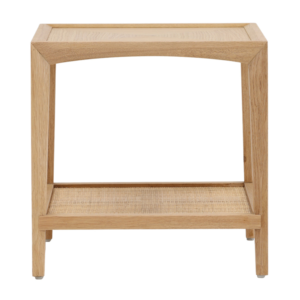This is a square side table made of light-colored oak wood, with a simple and modern design. The top of the table is flat and smooth, while the lower part has a shelf made of woven rattan, giving it a textured feel. The table stands on four legs, each extending from the corners, providing a stable base. The overall feel is lightweight and natural, with a combination of smooth and textured surfaces.