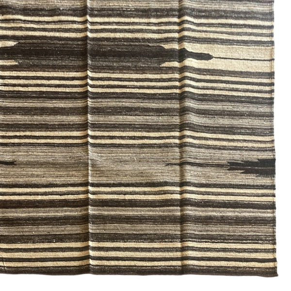 Earth tone striped kilim rug 
