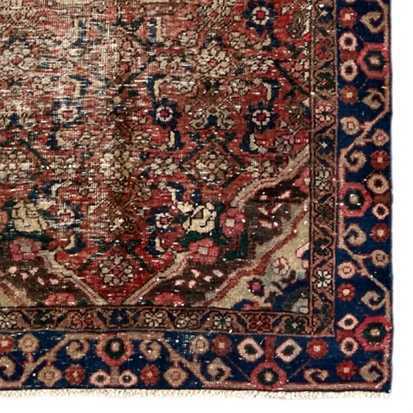 Vintage Persian accent rug with blue border and red and pink accents