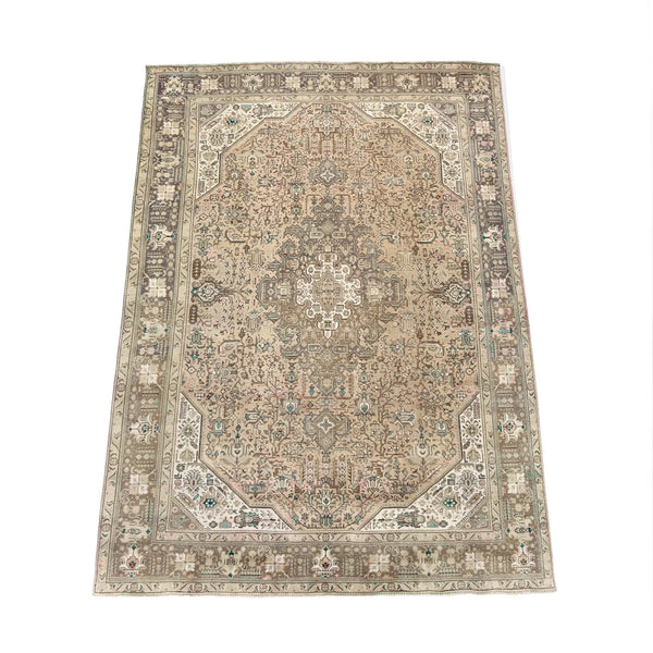 large vintage tabriz area rug in soft earth tones