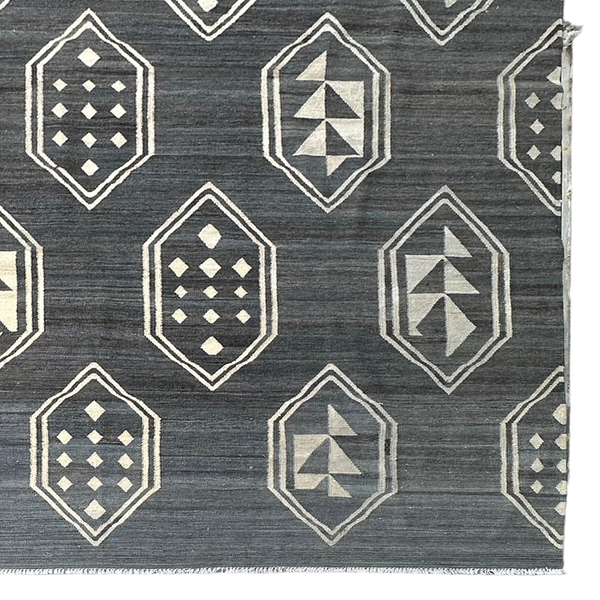 Grey kilim rug with white geometric designs