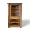 Light pine wood corner cabinet with interesting geometric carving art deco details along the top and sides. 