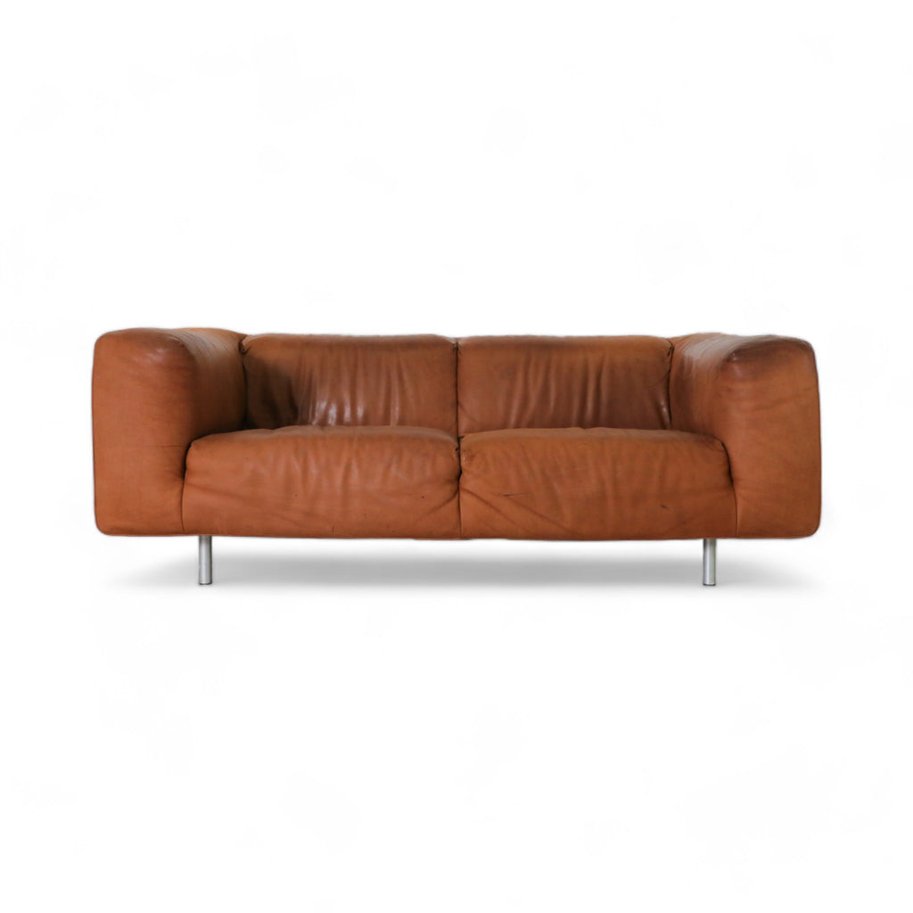 Two seater leather sofa with metal legs