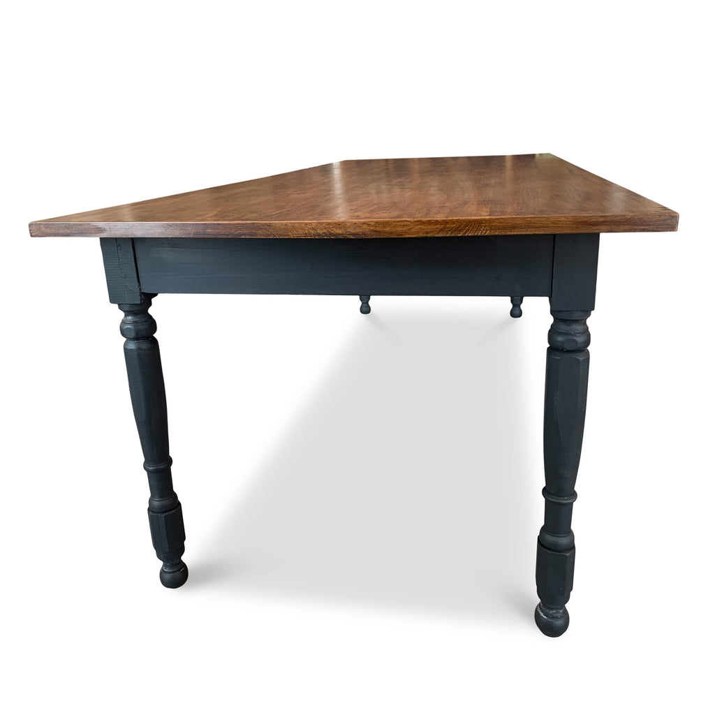 Farm table with dark blue painted base and rustic wood table top