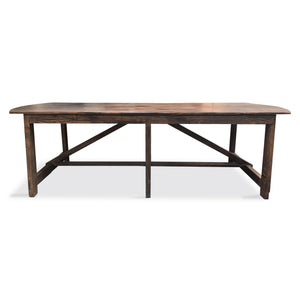 Reclaimed wood table with trestle base