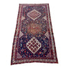 Rectangular antique Persian rug in rich red, blue and ivory details