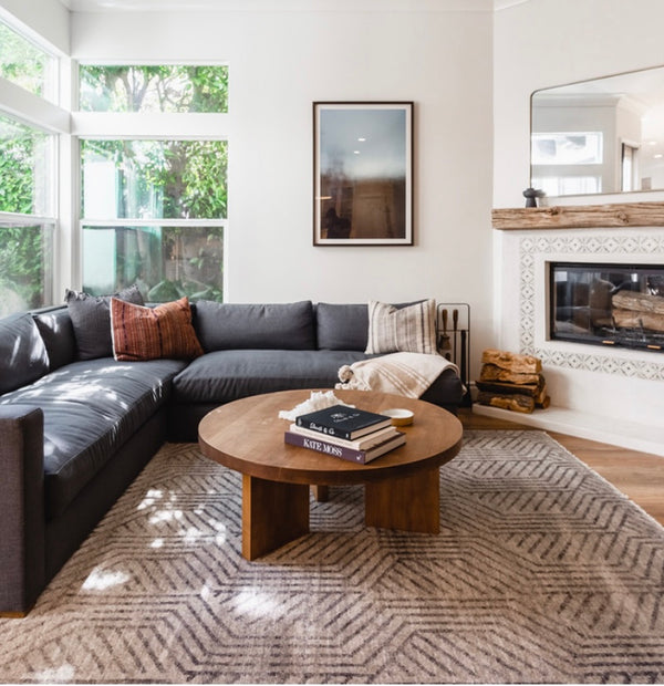 Scandinavian mcm coffee table in warm chestnut stain with art books