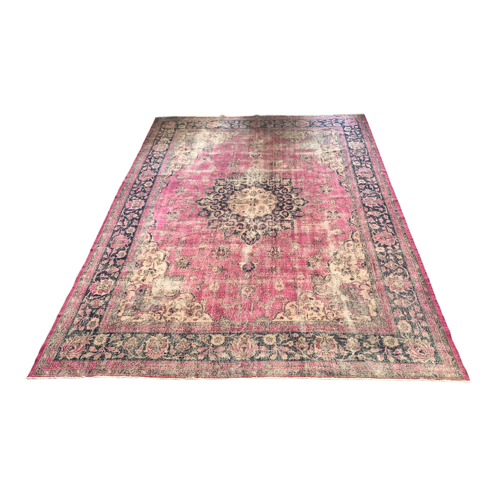 Pink and black vintage Persian area rug