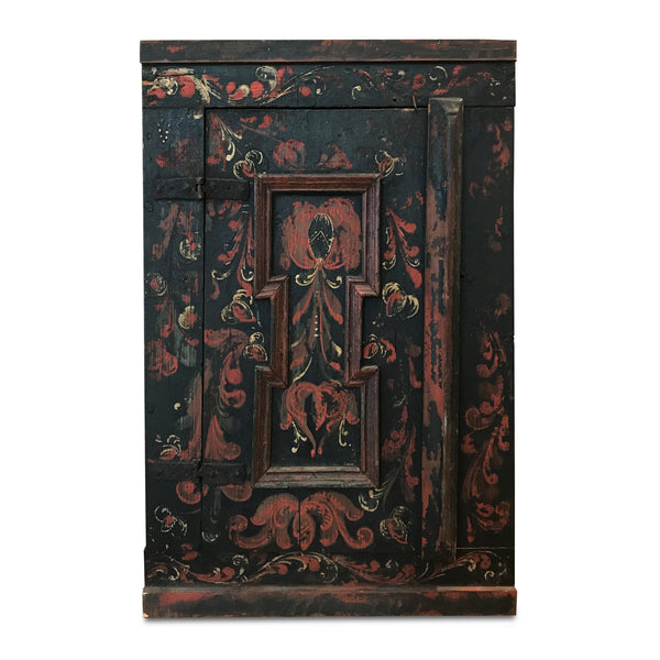 antique black painted wooden cupboard with hand-painted red and gold floral design